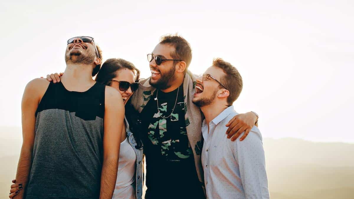 a group of millennials happy about improving their credit scores